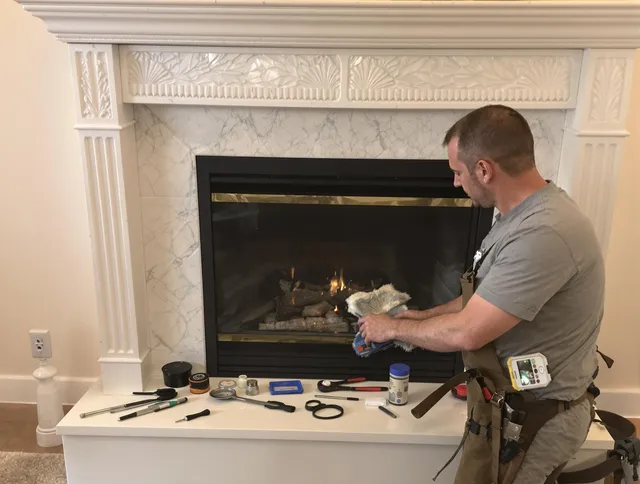 Fort Myers Chimney Sweep performing fireplace maintenance in Fort Myers, FL